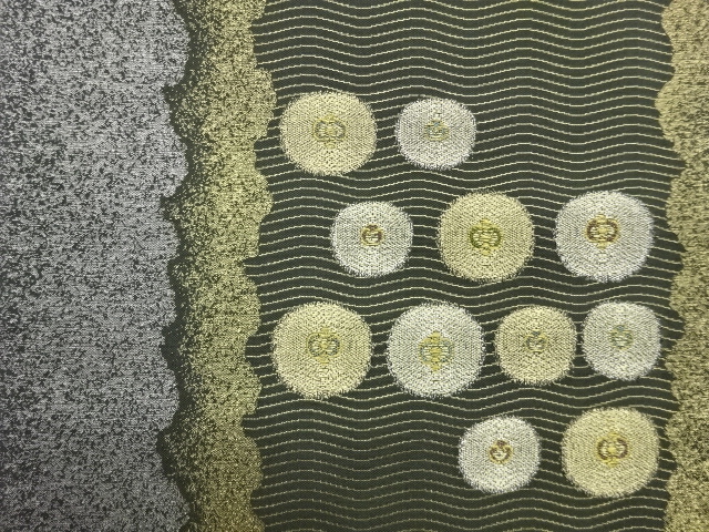  抽象縞に丸模様織出し袋帯